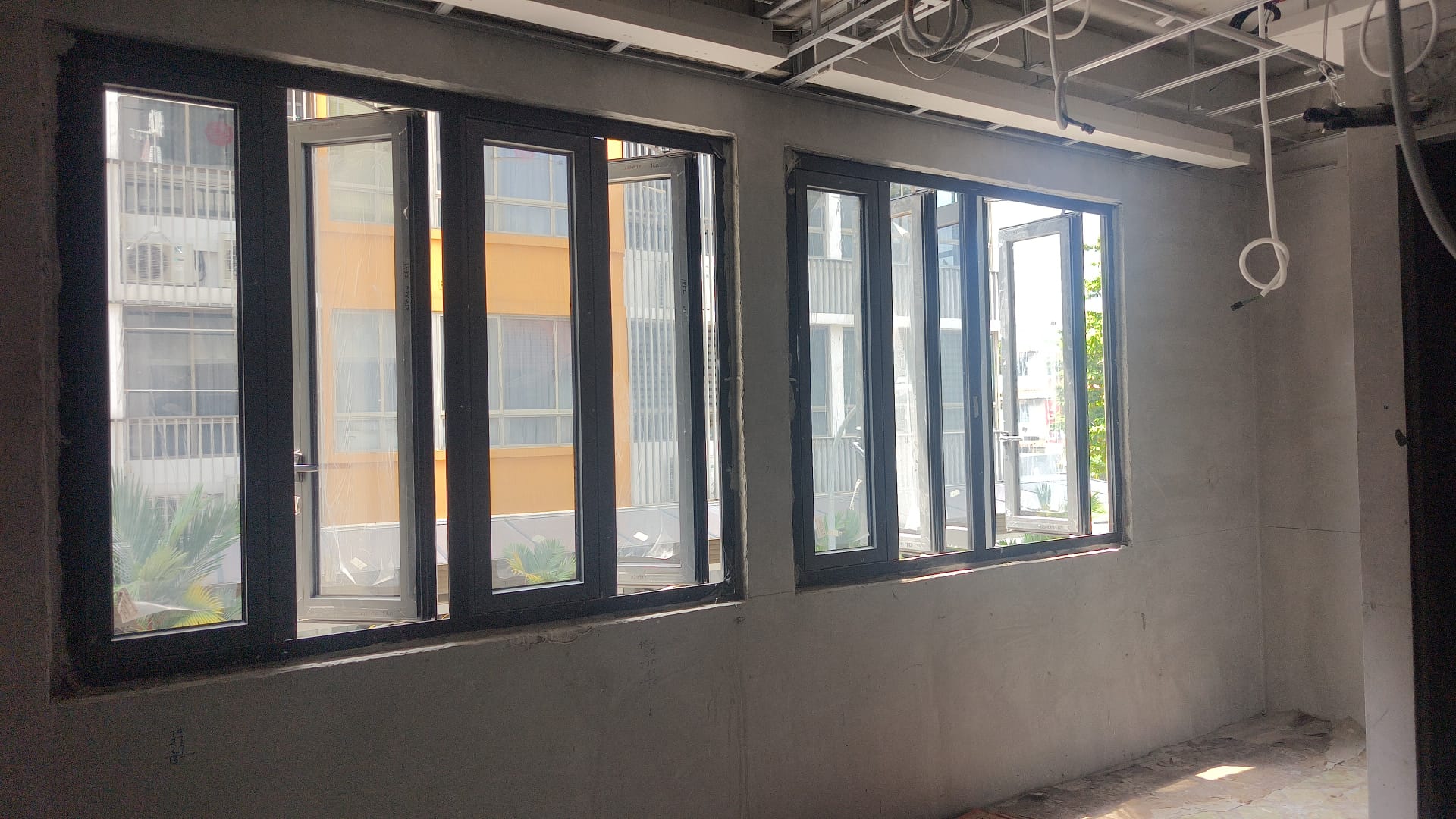 Installed black-framed glass windows